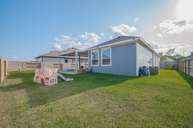 4507 Mustang Run Dr, Rosenberg, TX 77469 - back of property featuring central AC unit