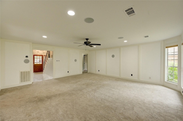 1802 Cobblestone Ct, Richmond, TX 77406 - unfurnished room featuring light carpet, stairs, ceiling fan, and recessed lighting