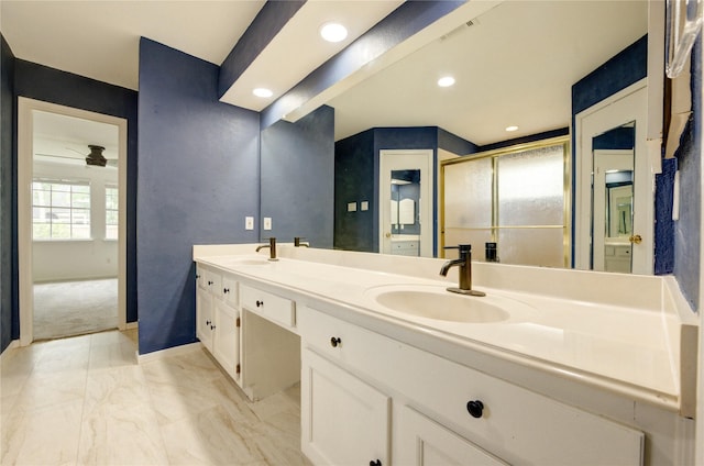 1802 Cobblestone Ct, Richmond, TX 77406 - bathroom featuring double vanity, baseboards, ceiling fan, a shower with door, and recessed lighting