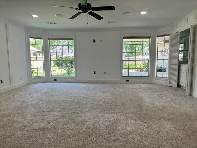 1802 Cobblestone Ct, Richmond, TX 77406 - carpeted spare room with plenty of natural light, a ceiling fan, recessed lighting, and baseboards