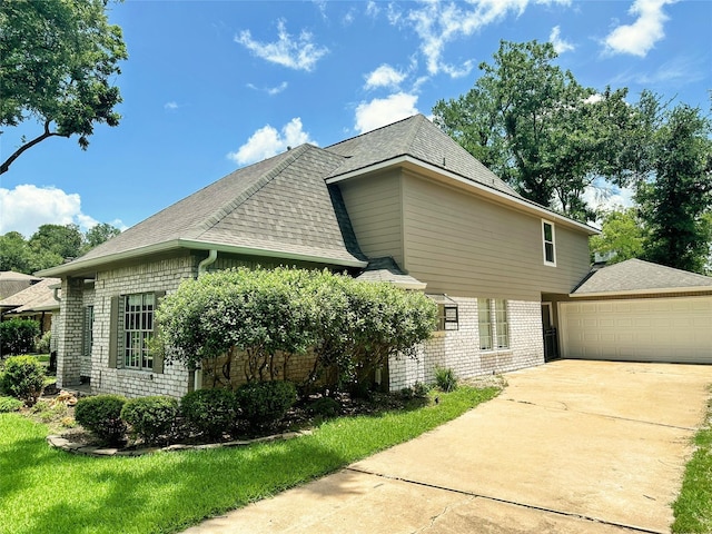 1802 Cobblestone Ct, Richmond, TX 77406 - view of side of home featuring brick siding, a shingled roof, and driveway