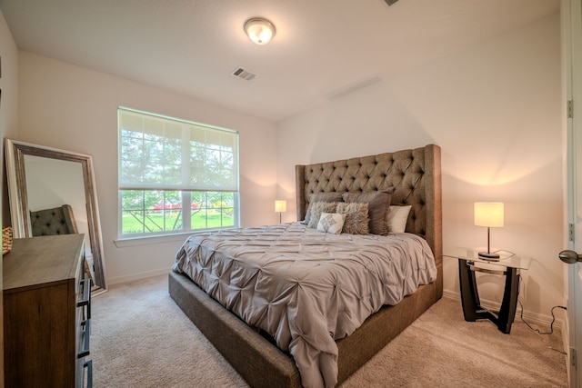 2003 Jitterbug Ln, Katy, TX 77493 - bedroom with light colored carpet and baseboards