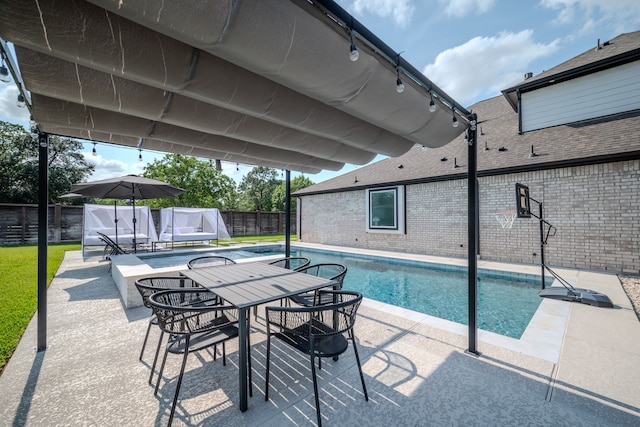 2003 Jitterbug Ln, Katy, TX 77493 - view of swimming pool featuring a patio area and a fenced backyard