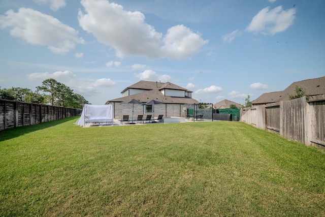 2003 Jitterbug Ln, Katy, TX 77493 - view of yard with a patio