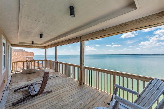 247 Isles End Rd, Tiki Island, TX 77554 - wooden terrace featuring a water view