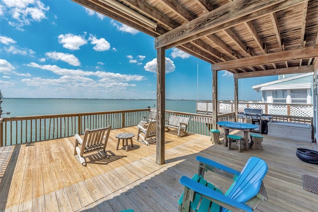 247 Isles End Rd, Tiki Island, TX 77554 - wooden terrace with a water view and grilling area