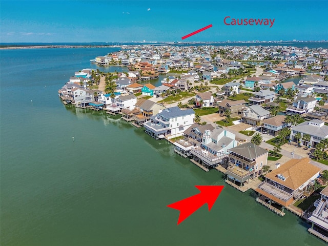 247 Isles End Rd, Tiki Island, TX 77554 - aerial perspective of suburban area featuring a large body of water