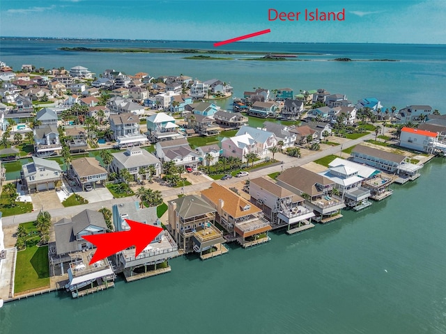 247 Isles End Rd, Tiki Island, TX 77554 - aerial view of residential area featuring a nearby body of water