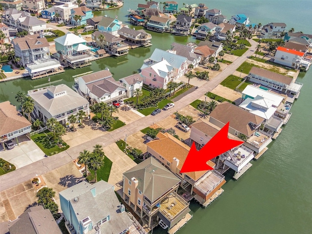 247 Isles End Rd, Tiki Island, TX 77554 - aerial view of residential area featuring a nearby body of water