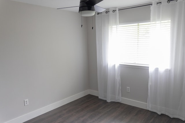 1204 Osborne Dr, Friendswood, TX 77546 - unfurnished room with dark wood-style flooring and baseboards