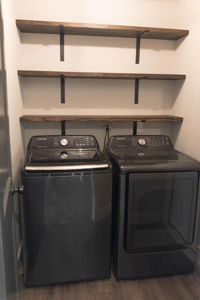 1204 Osborne Dr, Friendswood, TX 77546 - laundry room with wood finished floors and independent washer and dryer