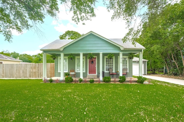 810 Stubbs St, La Marque, TX 77568 - view of front of property featuring covered porch, a shingled roof, a garage, and concrete driveway