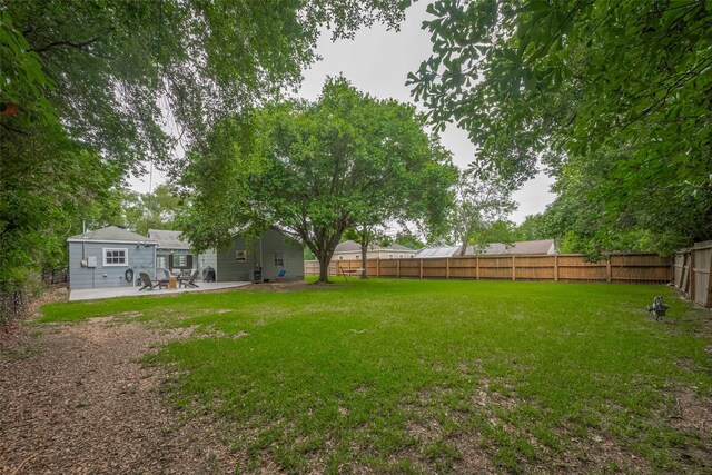 810 Stubbs St, La Marque, TX 77568 - view of yard with a patio