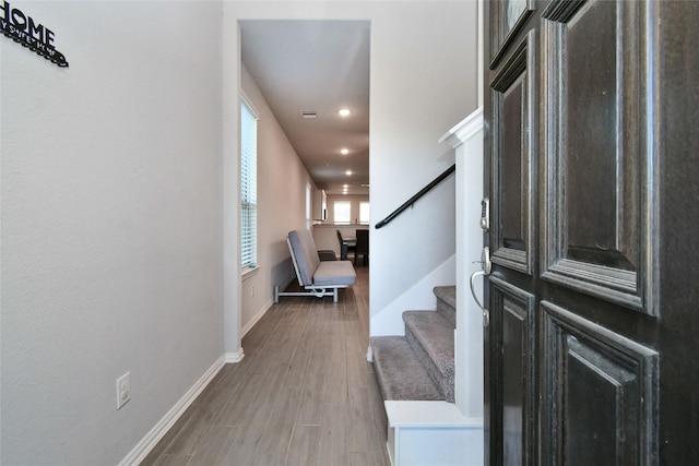 7419 French Quarter Ct, Fulshear, TX 77441 - entrance foyer with wood finished floors, baseboards, recessed lighting, and stairway