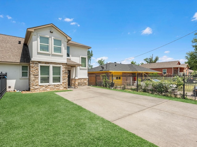 7718 Duncan St, Houston, TX 77093 - view of front of home featuring stone siding, stucco siding, and roof with shingles