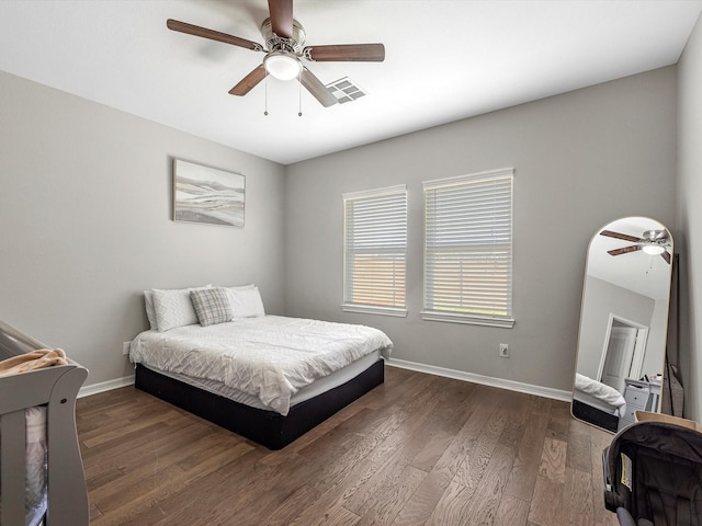 7718 Duncan St, Houston, TX 77093 - bedroom with baseboards, wood finished floors, and a ceiling fan