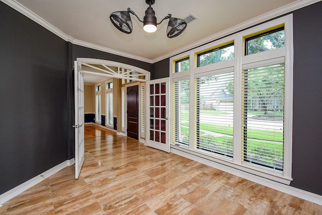 3911 Fielder Cir, Missouri City, TX 77459 - spare room with a chandelier, crown molding, and baseboards