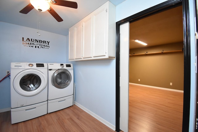 3911 Fielder Cir, Missouri City, TX 77459 - laundry area featuring cabinet space, washer and dryer, light wood-style floors, ceiling fan, and baseboards