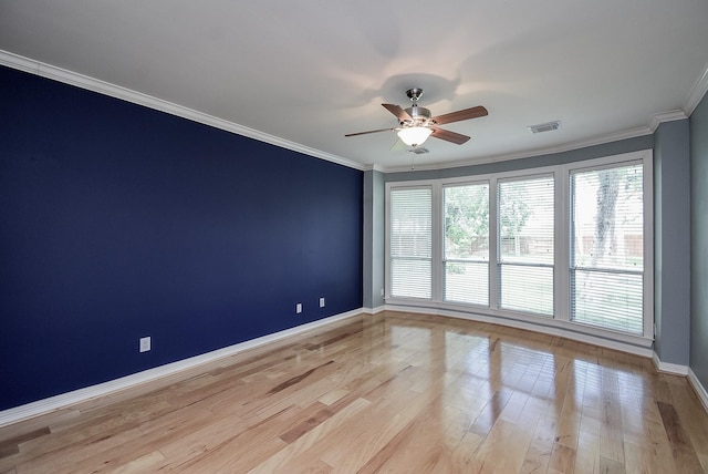3911 Fielder Cir, Missouri City, TX 77459 - unfurnished room with a ceiling fan, crown molding, baseboards, and light wood-type flooring