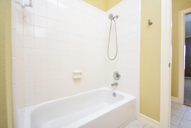 3911 Fielder Cir, Missouri City, TX 77459 - bathroom with tile patterned flooring, baseboards, and shower / washtub combination