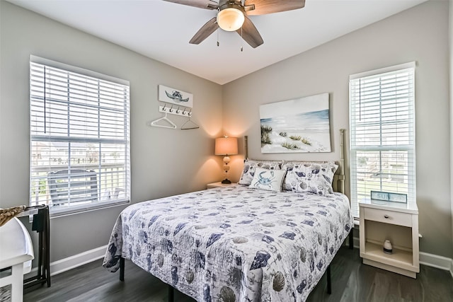 4126 Reeves Dr, Galveston, TX 77554 - bedroom with baseboards, dark wood finished floors, and ceiling fan