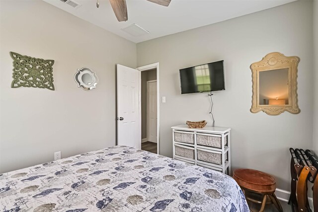 4126 Reeves Dr, Galveston, TX 77554 - bedroom with baseboards and ceiling fan