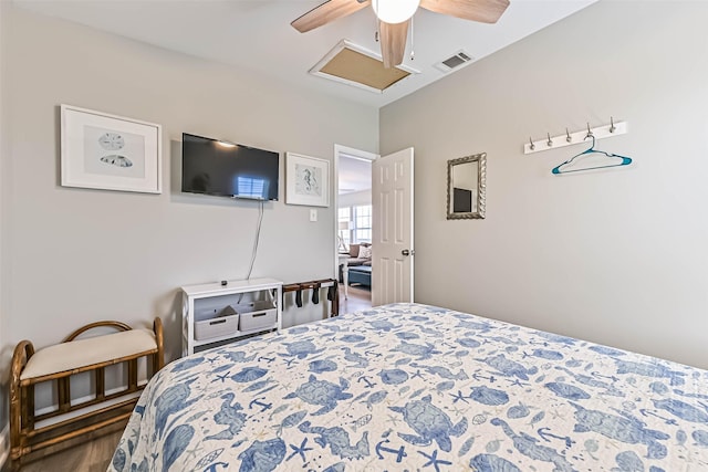 4126 Reeves Dr, Galveston, TX 77554 - bedroom featuring wood finished floors and a ceiling fan