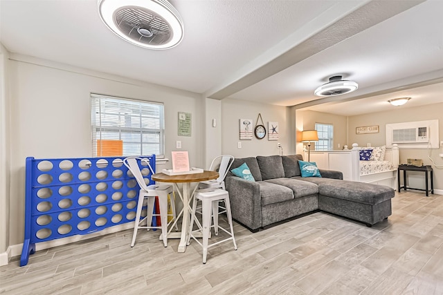 4126 Reeves Dr, Galveston, TX 77554 - living room featuring light wood-style flooring and baseboards