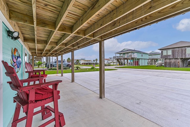 4126 Reeves Dr, Galveston, TX 77554 - view of patio featuring a residential view