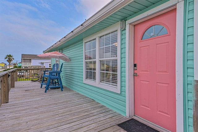 4126 Reeves Dr, Galveston, TX 77554 - view of exterior entry with a deck