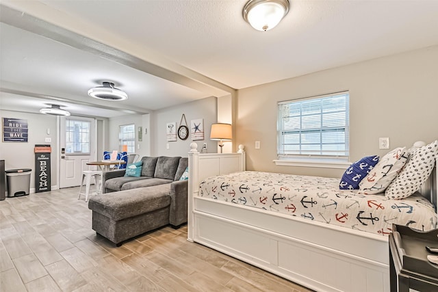 4126 Reeves Dr, Galveston, TX 77554 - bedroom with light wood finished floors