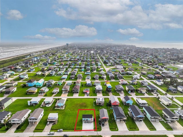 4126 Reeves Dr, Galveston, TX 77554 - aerial view of residential area with property boundaries highlighted and a large body of water