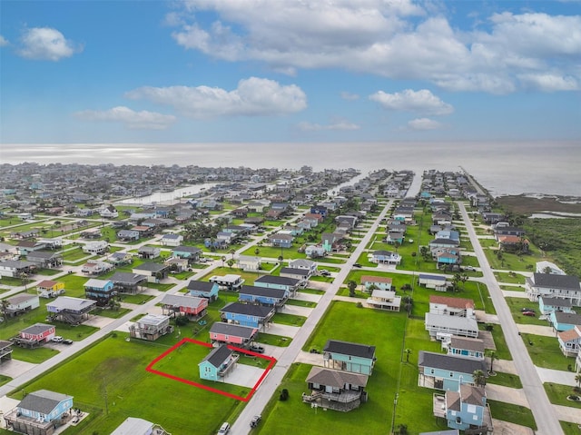 4126 Reeves Dr, Galveston, TX 77554 - aerial view of residential area with property boundaries highlighted and a nearby body of water