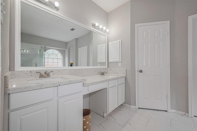 6718 Cleft Stone Dr, Houston, TX 77084 - full bath featuring double vanity, marble look tile flooring, a shower stall, and baseboards