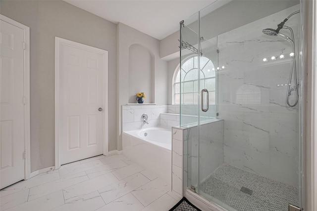 6718 Cleft Stone Dr, Houston, TX 77084 - full bath featuring marble finish floors, a bath, a marble finish shower, and baseboards