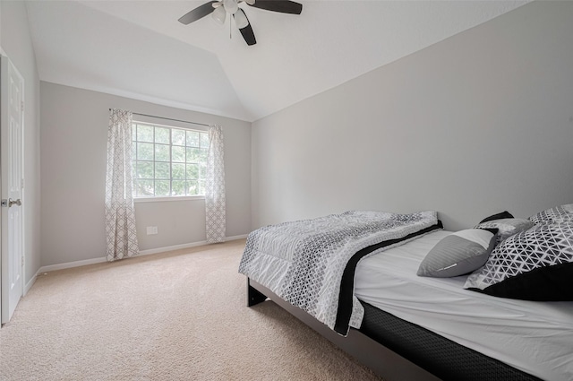 6718 Cleft Stone Dr, Houston, TX 77084 - bedroom with vaulted ceiling, baseboards, light colored carpet, and a ceiling fan