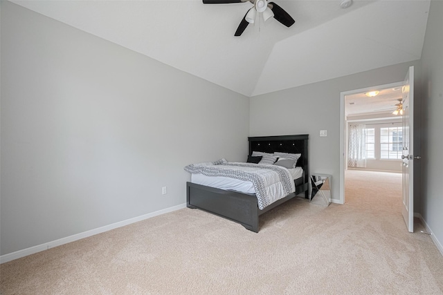 6718 Cleft Stone Dr, Houston, TX 77084 - carpeted bedroom featuring baseboards, lofted ceiling, and a ceiling fan