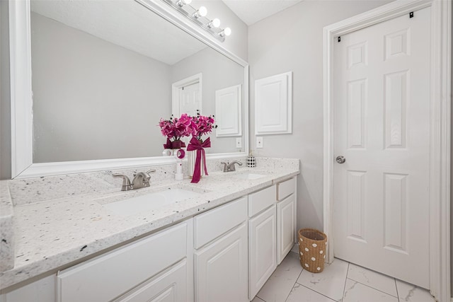 6718 Cleft Stone Dr, Houston, TX 77084 - full bathroom with marble look tile flooring and double vanity