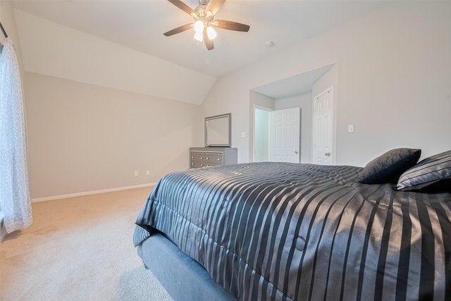 6718 Cleft Stone Dr, Houston, TX 77084 - bedroom with carpet floors, baseboards, lofted ceiling, and ceiling fan