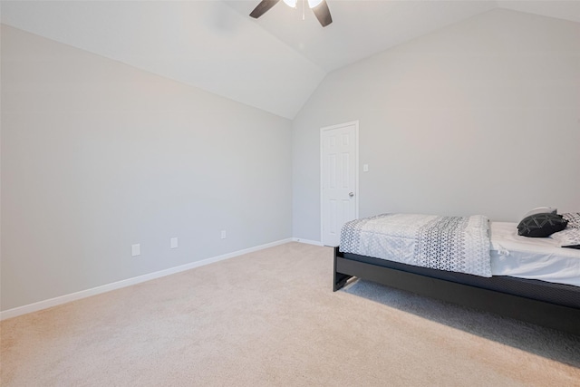 6718 Cleft Stone Dr, Houston, TX 77084 - bedroom featuring lofted ceiling, light colored carpet, ceiling fan, and baseboards