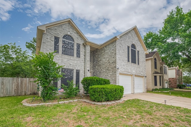 6718 Cleft Stone Dr, Houston, TX 77084 - view of front facade with a garage, driveway, and brick siding