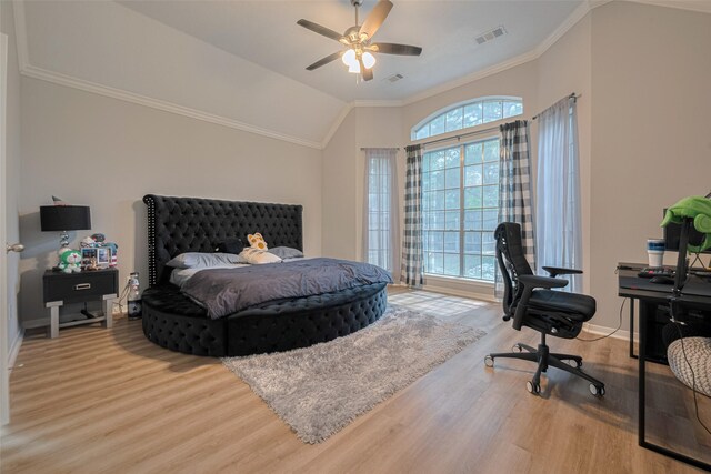 6718 Cleft Stone Dr, Houston, TX 77084 - bedroom with wood finished floors, crown molding, baseboards, a desk, and lofted ceiling