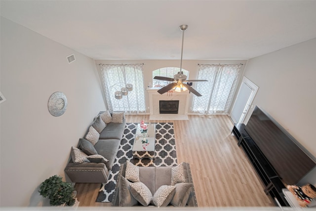 6718 Cleft Stone Dr, Houston, TX 77084 - living room with wood finished floors and ceiling fan
