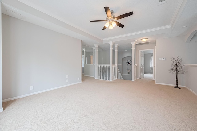 6718 Cleft Stone Dr, Houston, TX 77084 - empty room featuring light colored carpet, decorative columns, a ceiling fan, crown molding, and baseboards