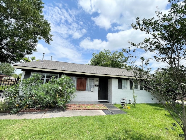 4118 Ebbtide Dr, Houston, TX 77045 - view of front of property featuring brick siding and roof with shingles