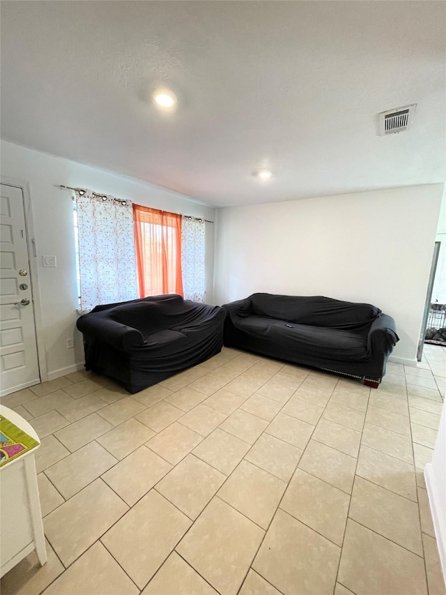 4118 Ebbtide Dr, Houston, TX 77045 - living area featuring light tile patterned flooring