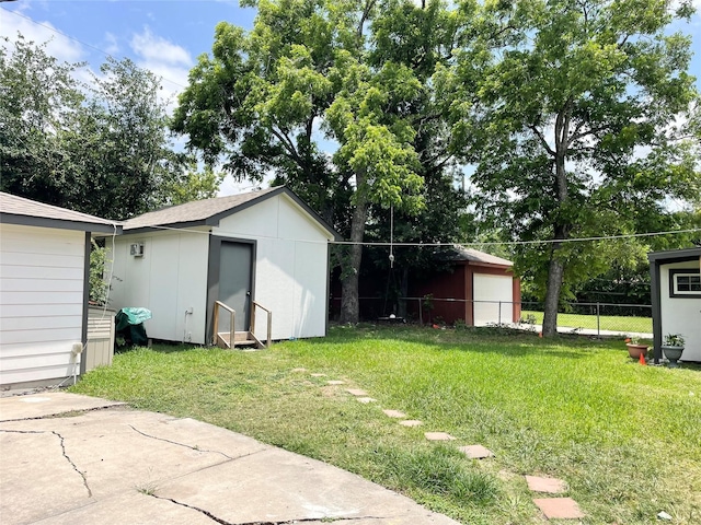4118 Ebbtide Dr, Houston, TX 77045 - view of yard with a detached garage