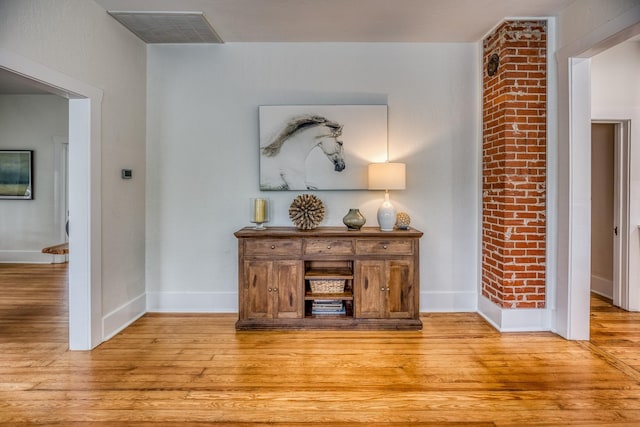1708 S Park St, Brenham, TX 77833 - hallway featuring light wood finished floors and baseboards