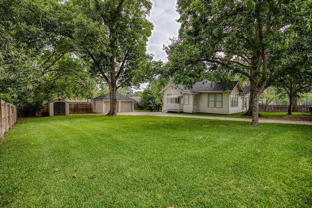 1708 S Park St, Brenham, TX 77833 - view of yard with a garage