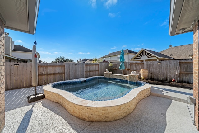 2517 Royal Terns Ct, League City, TX 77573 - view of pool featuring a fenced backyard, a patio, and an in-ground hot tub